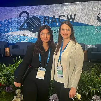 Jo Thapa and Haley Armstrong at a conference